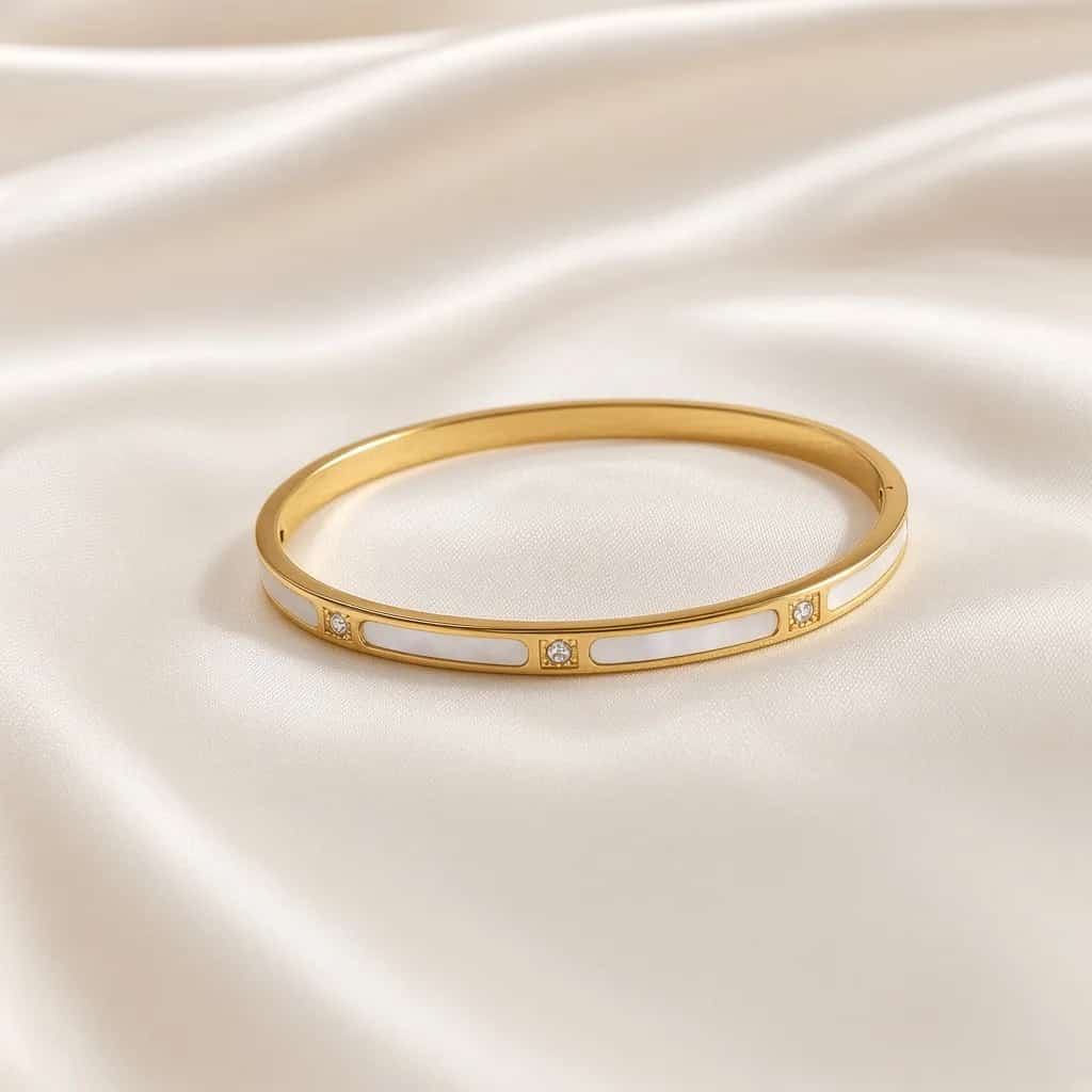 Slim gold bangle with white mother-of-pearl inlay and crystal dots — anti-tarnish bracelet by The Luxe Jewels