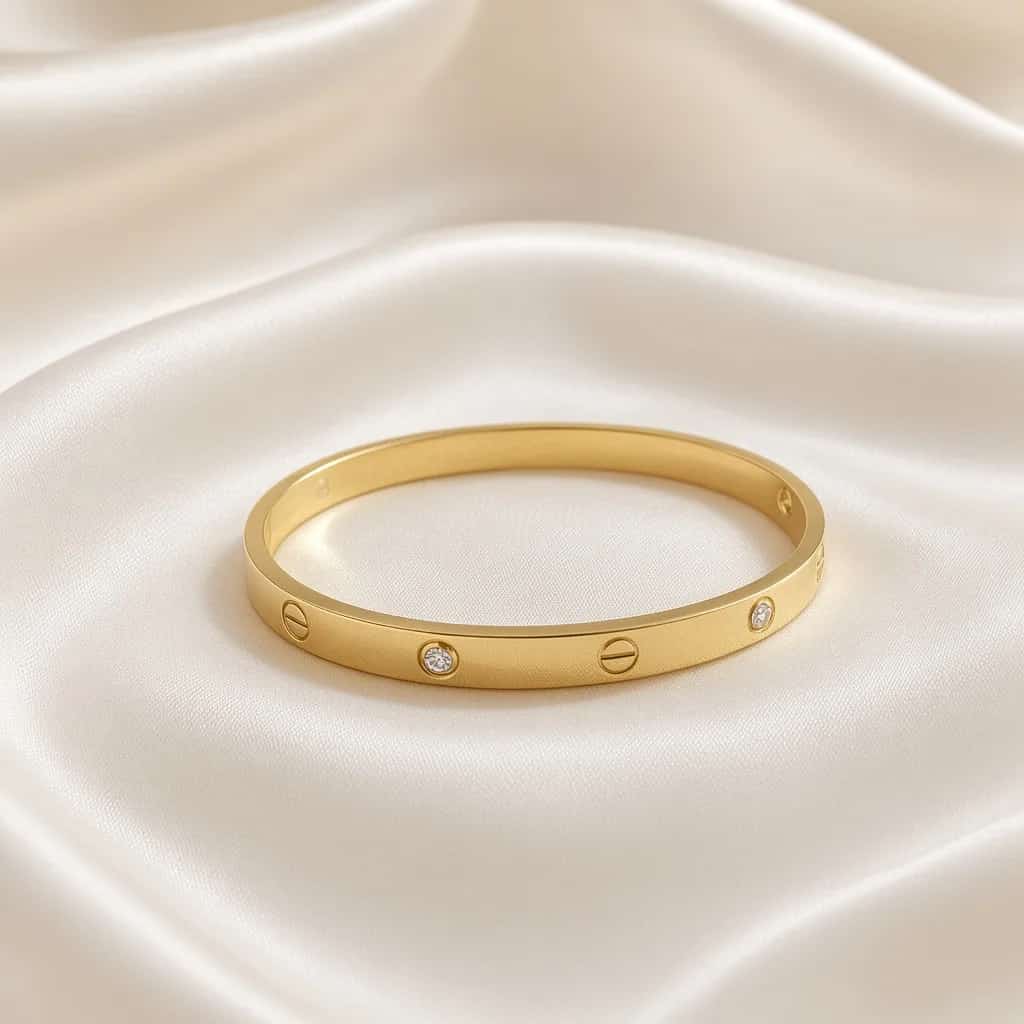 Gold screw-motif bangle with cubic zirconia accents — 18k gold plated anti-tarnish bracelet by The Luxe Jewels
