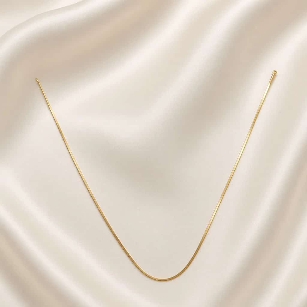 Slim gold snake chain necklace on white silk — 18k gold plated anti-tarnish necklace by The Luxe Jewels